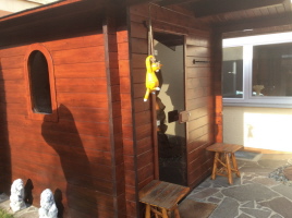 Blockbohlensauna im Garten